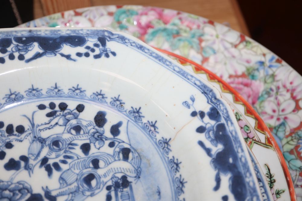 A collection of Oriental chargers and plates,